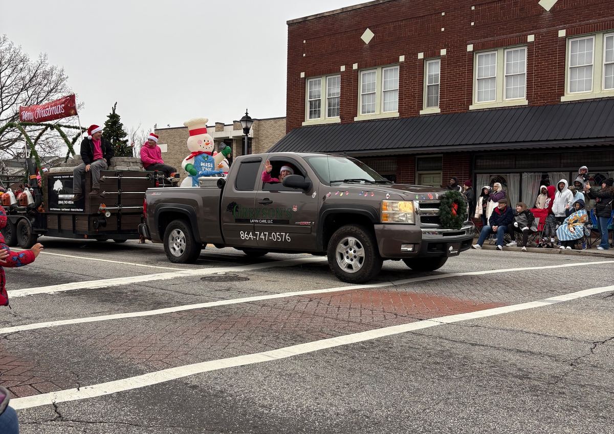 A company truck decorated for a local community parade.