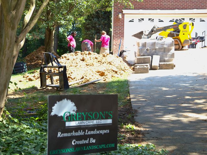 A Greyson&rsquo;s yard sign in the bed of a job in progress.