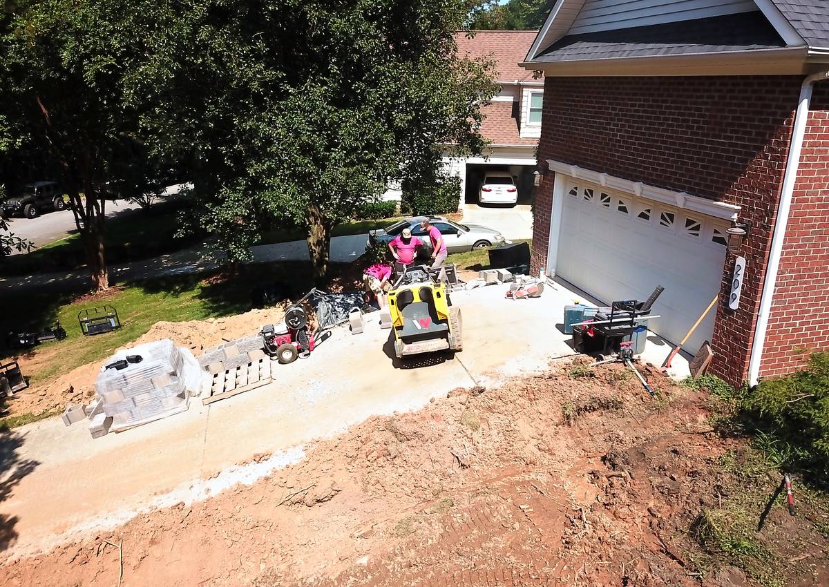 A graded dirt yard ready for the next stage.