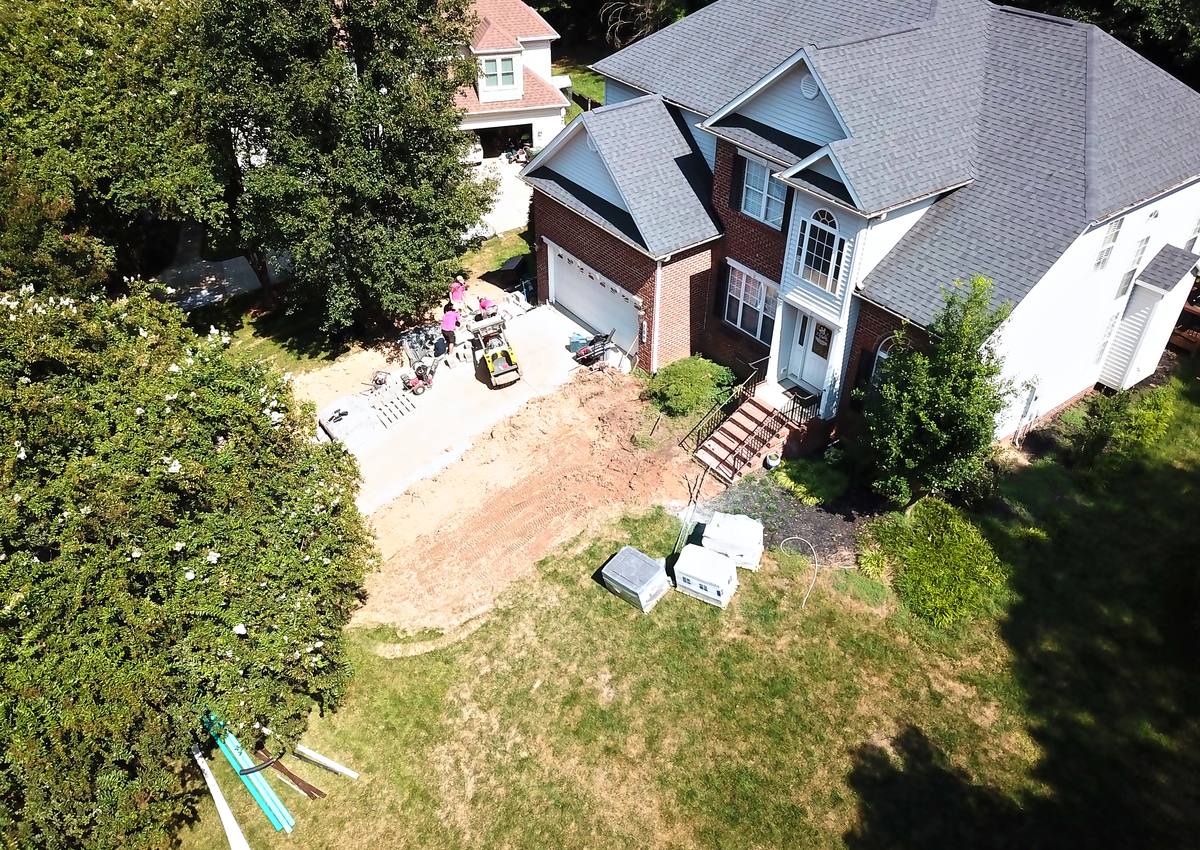 Retaining wall block staged at the house before the build.