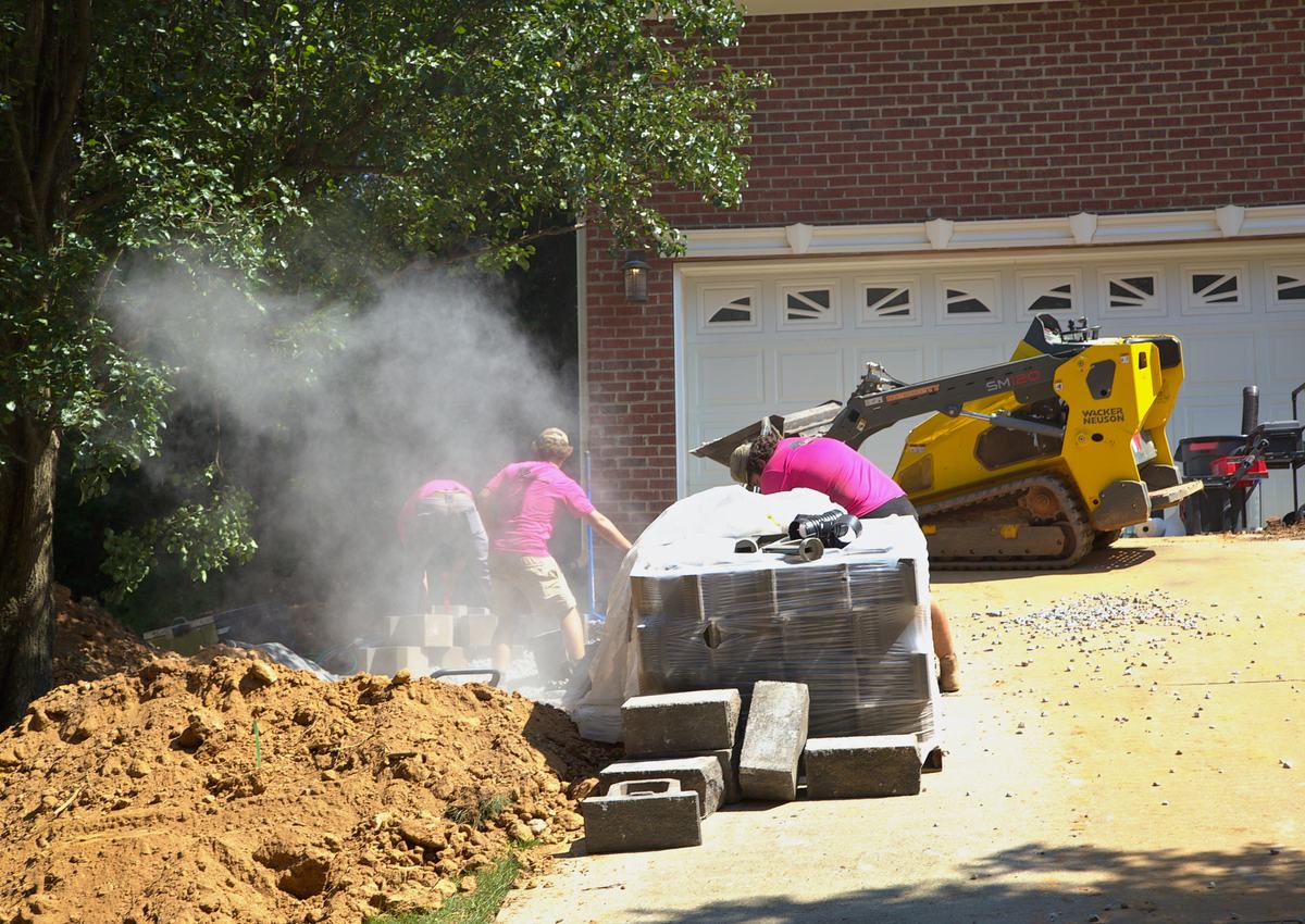 Cutting block on site, with the dust plume to show for it.