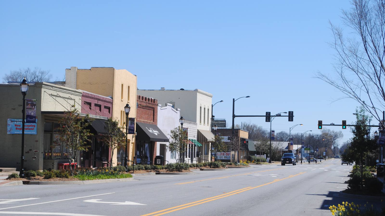 Main Street in downtown Fountain Inn, South Carolina, with storefronts along the road.